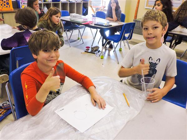 Students conducting a lab experiment. 